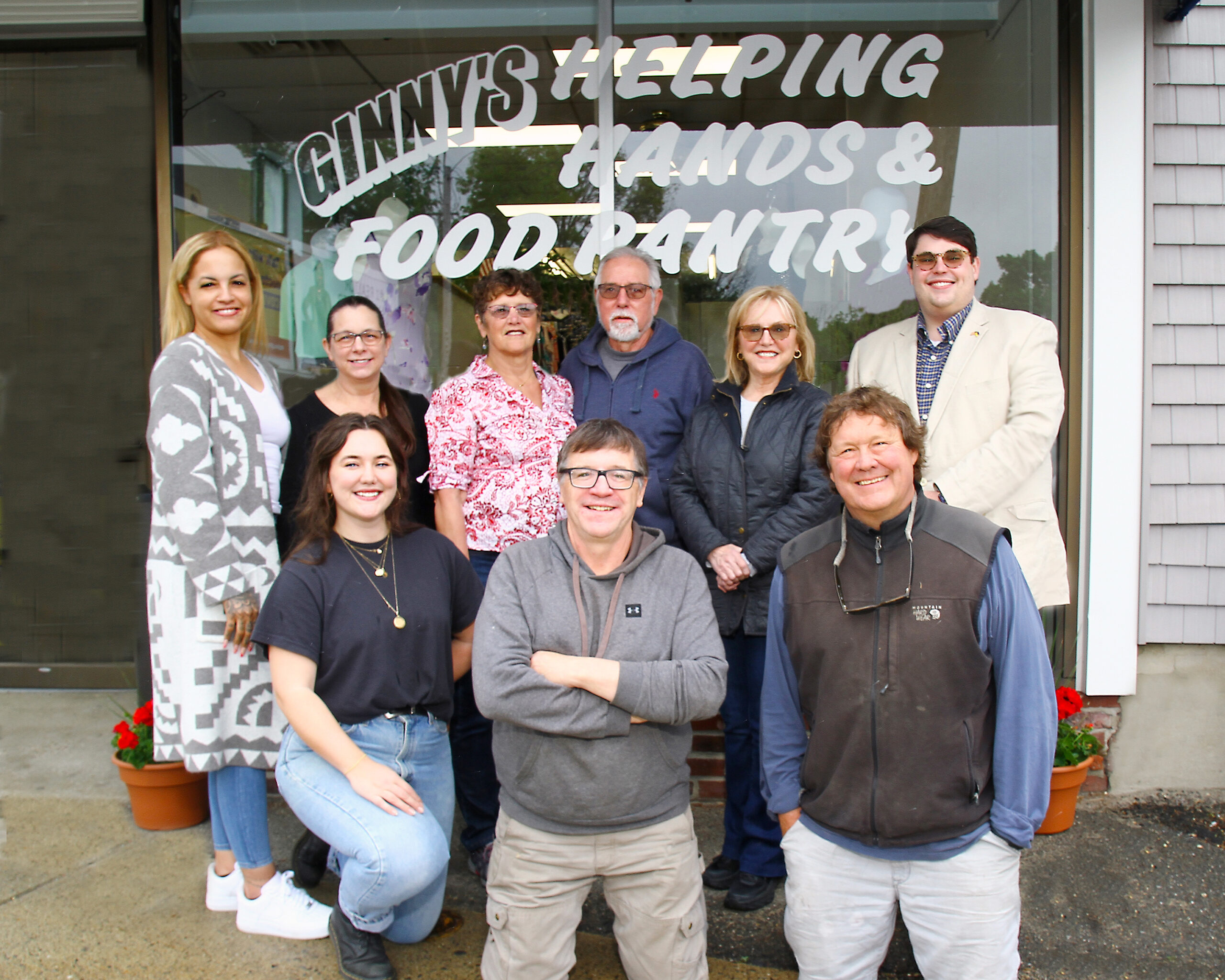 Ginny's staff from 

Left to Right Back Row: Mayra (Assistant Manager), Joan (Clothing Supervisor), Pat Freiss (Board of Directors and Volunteer) Rich Freiss (Volunteer), Sue Chalifoux Zephir (Board Clerk and Senior Advisor), Brandon L. Robbins (Executive Director) 

Front Row from Left to Right: Julia (Staff Member), Michael Pauley (Staff Member), Ed Zephir (Board of Directors and Volunteer)
